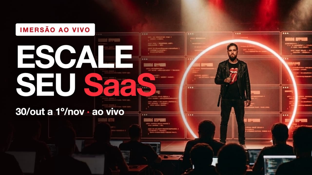 Arte do Escale seu SaaS: Laschuk no palco, diante de uma plateia com notebooks